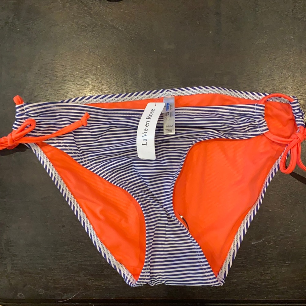 Medium neon and navy swim bottoms never worn